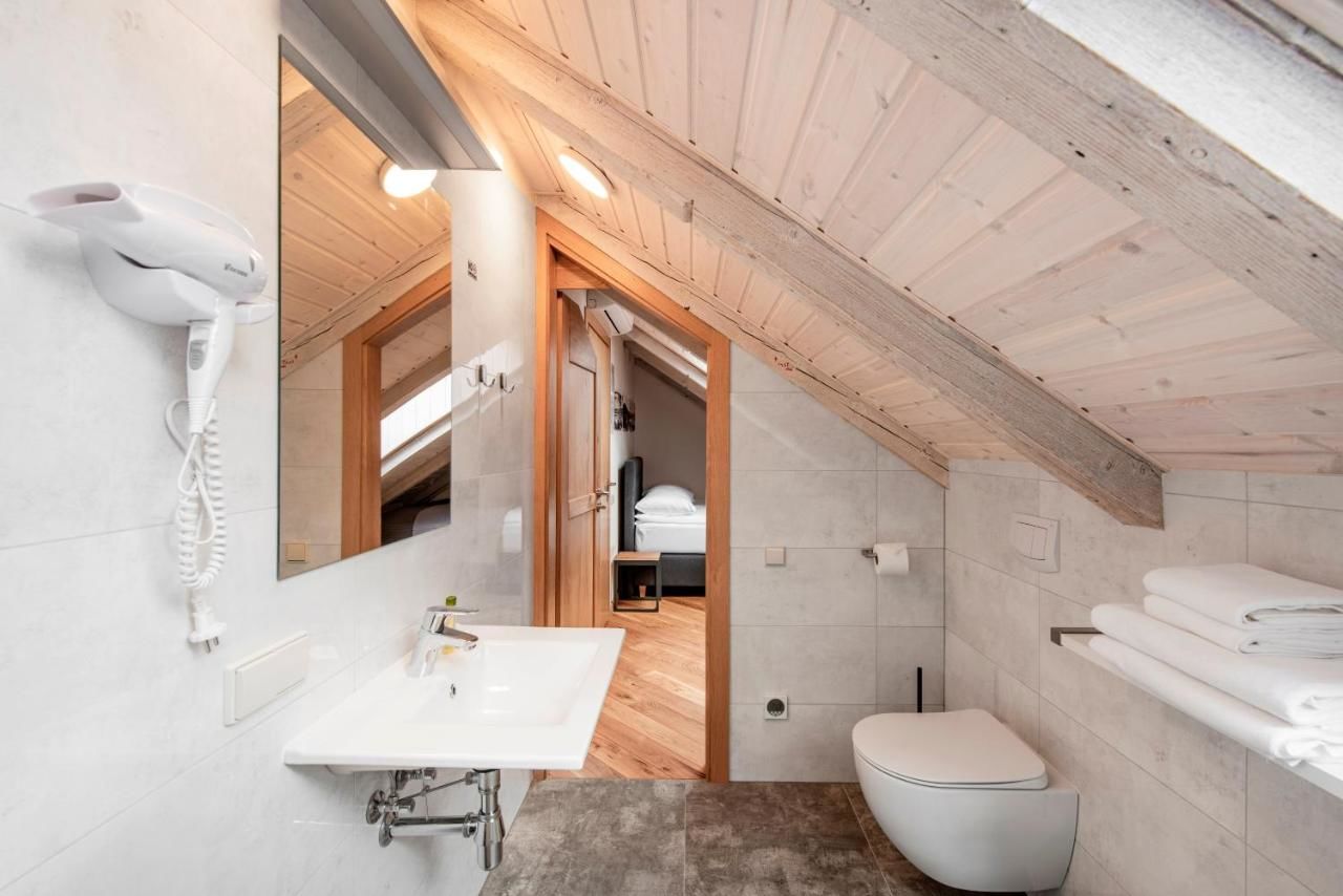 Апартаменты Small attic rooms in Kaunas old town Каунас-13