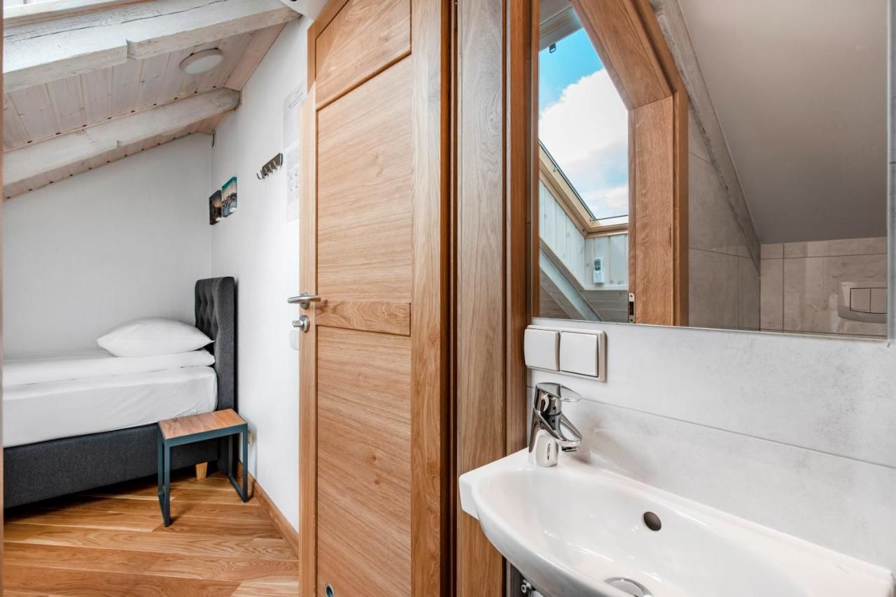 Апартаменты Small attic rooms in Kaunas old town Каунас-8