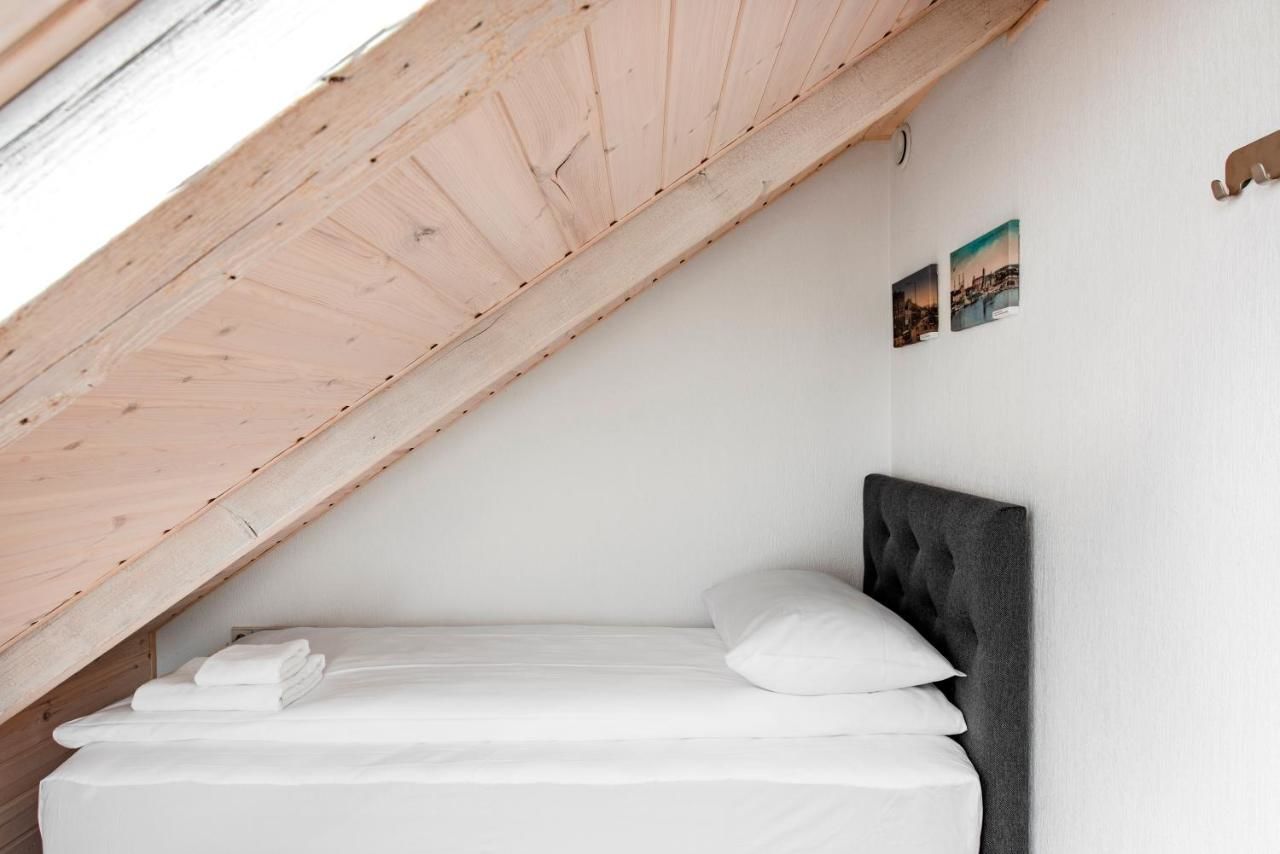 Апартаменты Small attic rooms in Kaunas old town Каунас-10