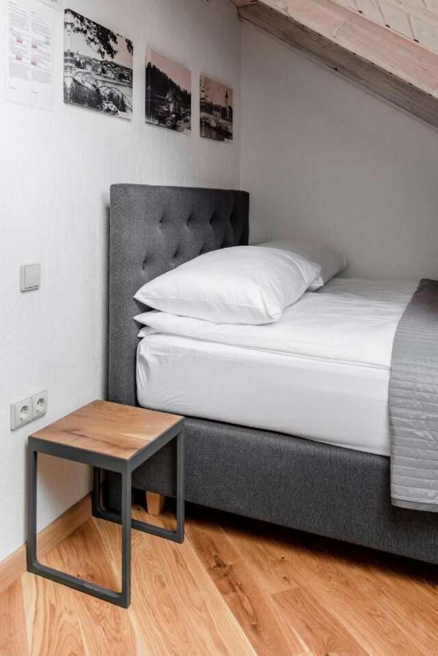 Апартаменты Small attic rooms in Kaunas old town Каунас-16