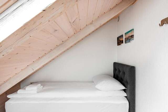 Апартаменты Small attic rooms in Kaunas old town Каунас-9